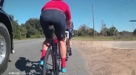 Dump truck close passes cyclist. Dangerous driving caught on camera