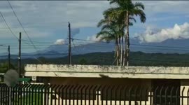 Smoke column from Sangay volcano eruption seen from Amazonia region in Ecuador