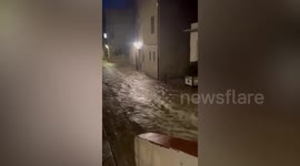Raging floods surge through street in south of France