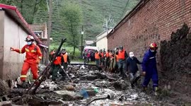 Flash floods caused by heavy rain hit northwestern China, killing 16