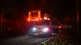 Tower 54 arriving and than beginning extinguishment of the multi alarm blaze