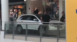 Elderly woman drives SUV into second floor plaza in Massachusetts