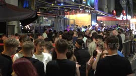 A-Level revellers paint the town red on broad street in Birmingham to celebrate exam results