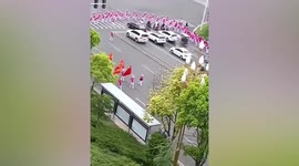 Walking group of 300 elderly people cross road in China, blocking traffic