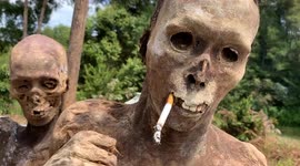 The living dead: Indonesia's Toraja people honour their dead by exhuming them and dressing them up in Ma'nene ritual