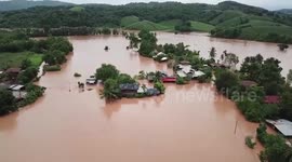 Residents struggle through floods following monsoon storm in northern Thailand