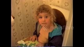 Girl Reads on Potty