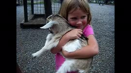 Kids Hold Pet Goat