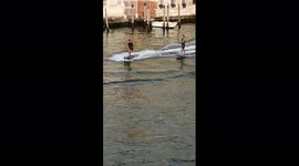 Aussies who surfed on Venice's Grand Canal to be sued by city