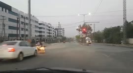 Horrific moment two men sent flying after speeding car collides with bike in southern India