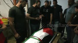Palestinians carry the body of Mohammad Arayshi succumbed to the wounds he sustained by Israeli gunfire during his funeral