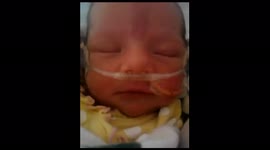 Parent singing to Baby