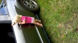 Girl Climbs Through Car Window