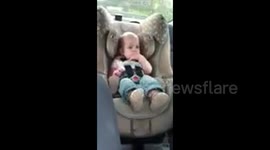 Baby Dances in Car