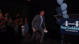 Dan Goldman takes stage, addresses supporters, and speaks to media as returns show him leading Democratic primary race in New York’s 10th Congressional District
