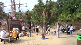 Children climbing crows nest of Captain Hooks pirate ship at Princess Diana Memorial Playground - London