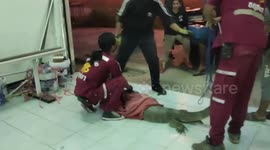 Large monitor lizard sparks panic after breaking into office building in Thailand