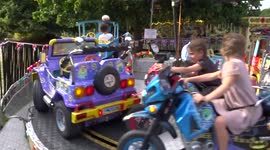Amusement rides bring fun and joy to children in Londons Kensington Gardens