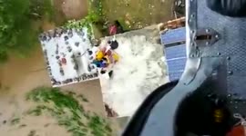 Officials launch rescue mission, evacuate 13 people stranded on rooftop due to flood in northern India