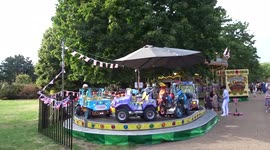 Londoners enjoy outdoors in a park on a gorgeous summer evening