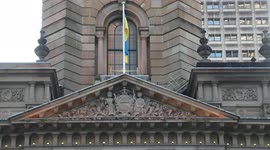 The Ukrainian flag flies over Sydney Town Hall, Australia