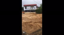 River of water and mud as Vietnam is hit by torrential rains