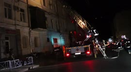 RAW VIDEO: Ukrainian Emergency Services Extinguish Fire And Defuse Missile In Kharkiv