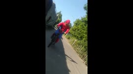 This is the Philippines version of Spider-man - man wearing a costume of Spider-man while riding a bicycle. It is funny to think that our spider-man was out of web hahahaha.