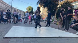 Young people breakdance in Kyiv ignoring air raids sirens on Independence Day