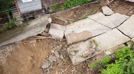 Road in Dharamshala, Himachal Pradesh, India Is Broken By Floods
