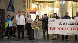 Ukrainians and supporters protest at Atlassian office in Sydney, Australia