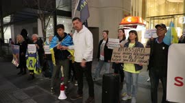 Ukrainians and supporters protest at Atlassian office in Sydney, Australia