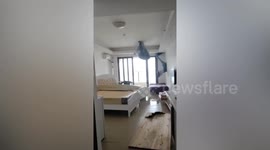 Powerful winds brought by Typhoon Ma-on batter China, blowing windows open