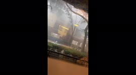 Microburst blasts Ybor City, Florida, with lashing winds
