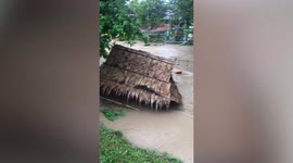 Flash floods submerge homes after monsoon rains in Thailand