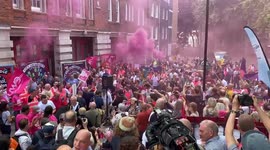 Protest turned party: Striking Royal Mail workers sing and dance in London