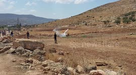 Palestinians take part in a demonstration against settlements in the village of Beit Dajan.