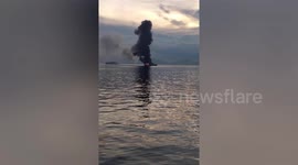 Philippines ferry engulfed by flames leaving nine people missing