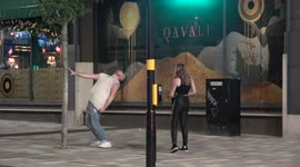Revellers paint the town red on Broad Street in Birmingham on Friday night during the last Bank Holiday weekend before Christmas