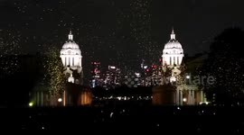 Illuminated bubbles light up sky over Greenwich, London