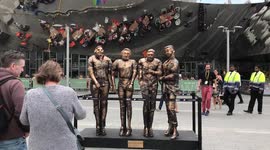 'Four lads in jeans' are immortalised with a statue in the spot where the meme was born