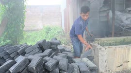Indonesia workers convert piles plastic waste into paving blocks