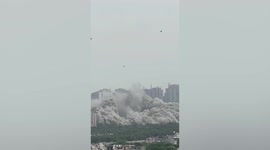 Apartment blocks collapse with controlled demolition in India
