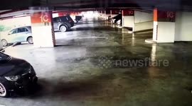 Driver crashes through third story car park barrier plunging to the ground