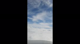 Flight landing from Turkey to the United Kingdom England flying into the clouds