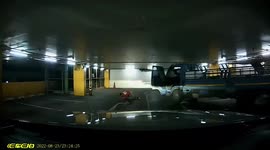 Passenger jumps from out-of-control truck rolling back down slope in car park