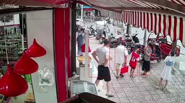 Cloud-seeding rocket narrowly misses pedestrians after falling from sky in China