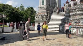 Tourists enjoy Buddhist temple in Bangkok as officials predict rising numbers for 2022