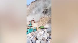 Miners scramble to safety as massive landslide buries excavators in Indonesia