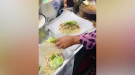 Bumbling cook dumps entire bottle of sauce on chicken rice dish